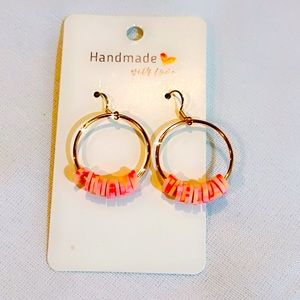 Round hoop earrings with orange